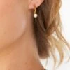 Show Me Your Mumu Luv AJ Bezel Charm Huggie Earrings ~ Gold -Show Me Your Mumu jordyn 5.1957028